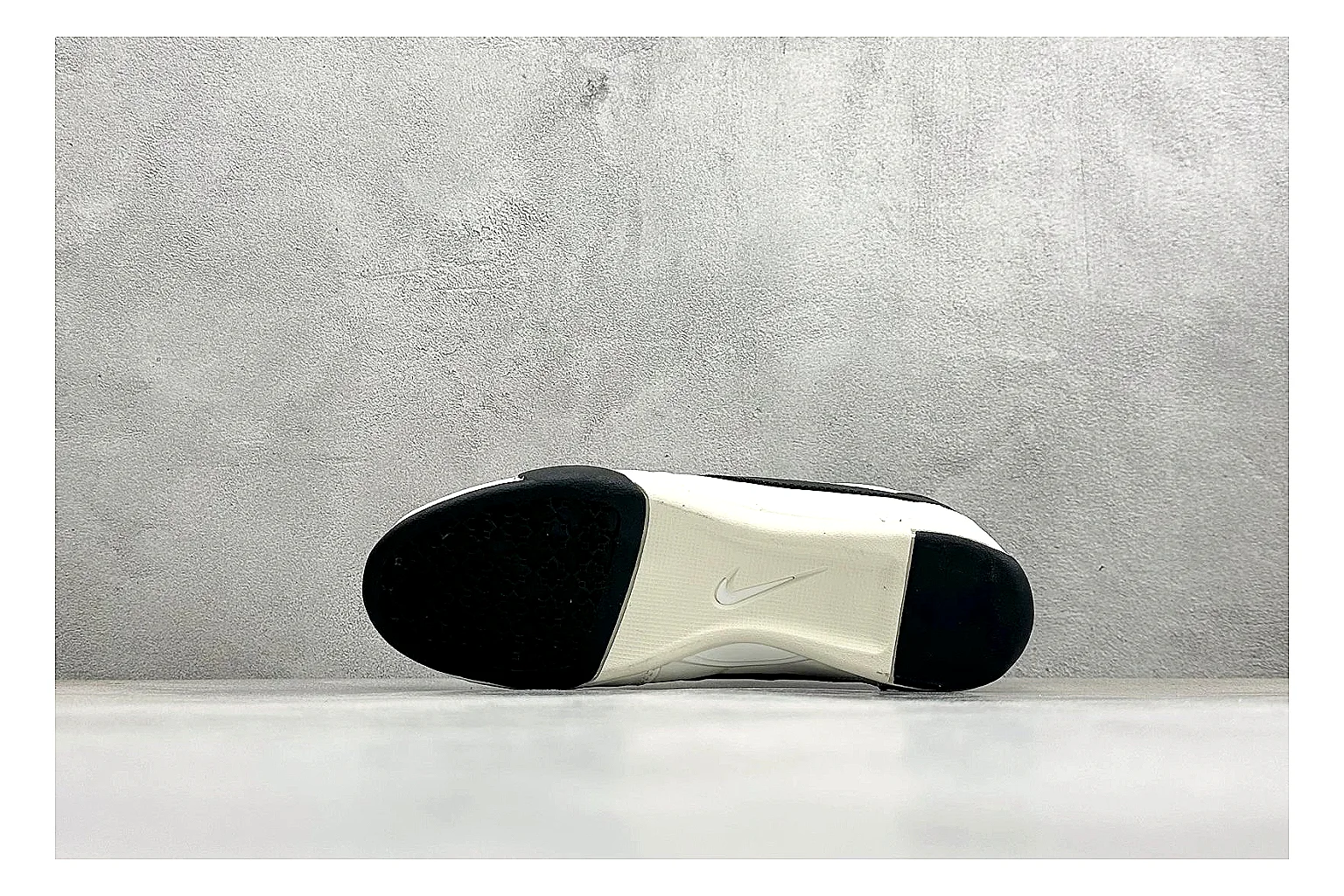 Nike Sprint Sister White Black budget find photo showing white retro-runner upper, black Swoosh contrast, slim low-top profile, and light casual sole thumbnail 5