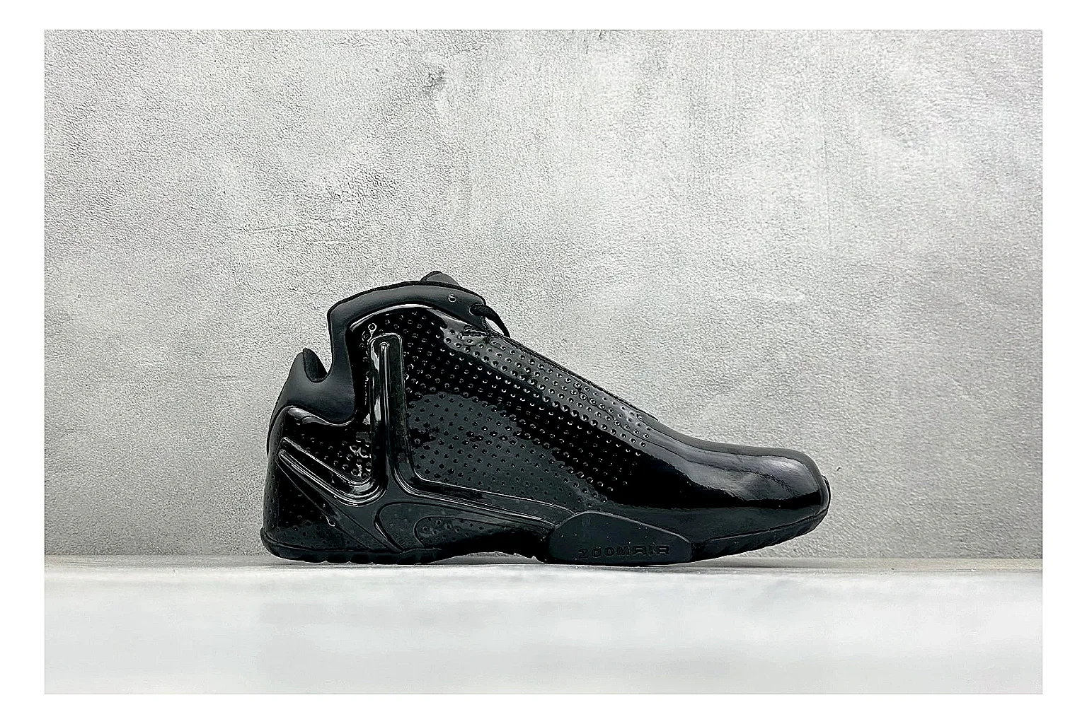 Nike Zoom Hyperflight Black budget find photo showing glossy black basketball upper, sleek shell shape, subtle Swoosh detail, and sculpted court sole thumbnail 2