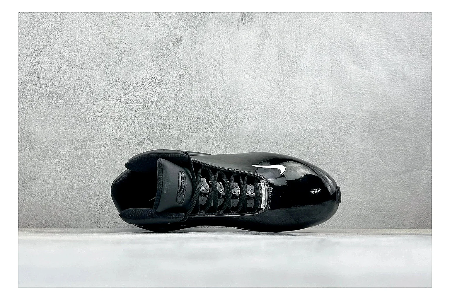 Nike Zoom Hyperflight Black budget find photo showing glossy black basketball upper, sleek shell shape, subtle Swoosh detail, and sculpted court sole thumbnail 3