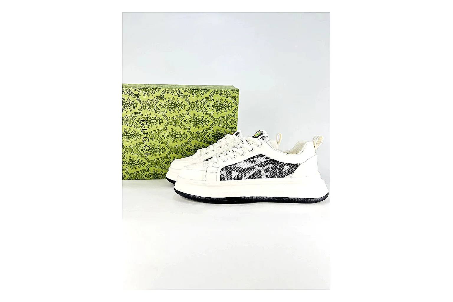 Low Runner White Black Sneaker budget find photo showing white black synthetic low-top upper, minimal runner shape, clean panels, and casual sole
