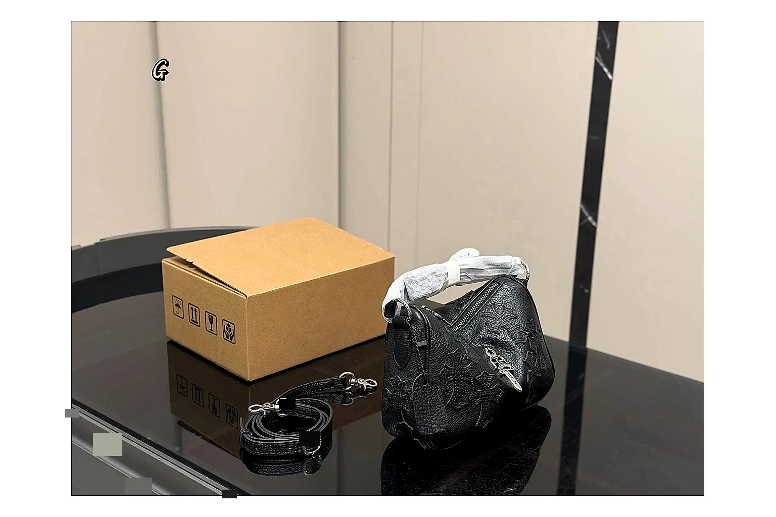 Mini Top Handle Black Bag budget find photo showing black leather compact bag body, structured handle, clean top-handle shape, and simple hardware