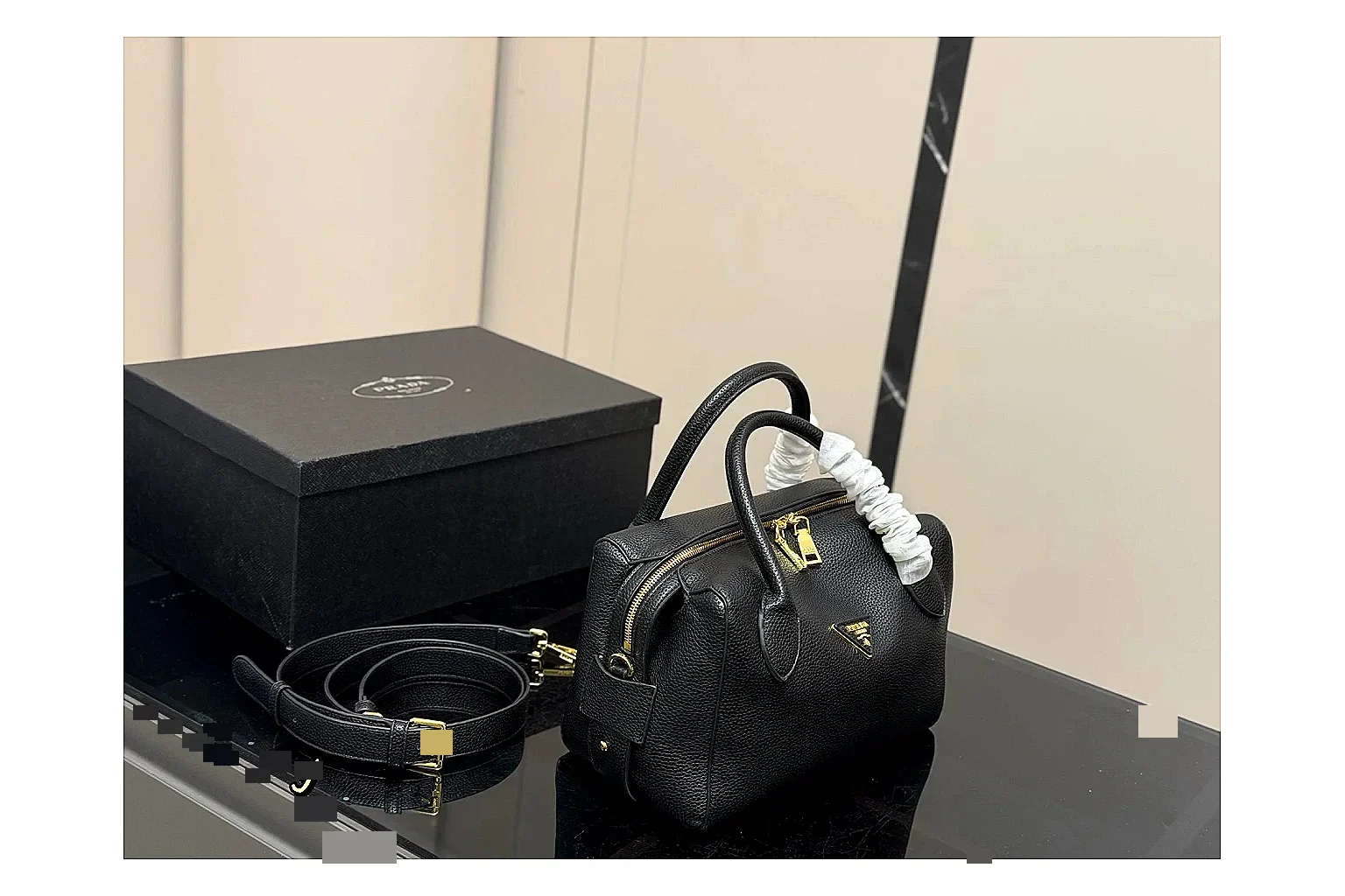 Prada Mini Top Handle Black budget find photo showing black leather mini bag body, structured top handle, compact silhouette, and clean metal hardware