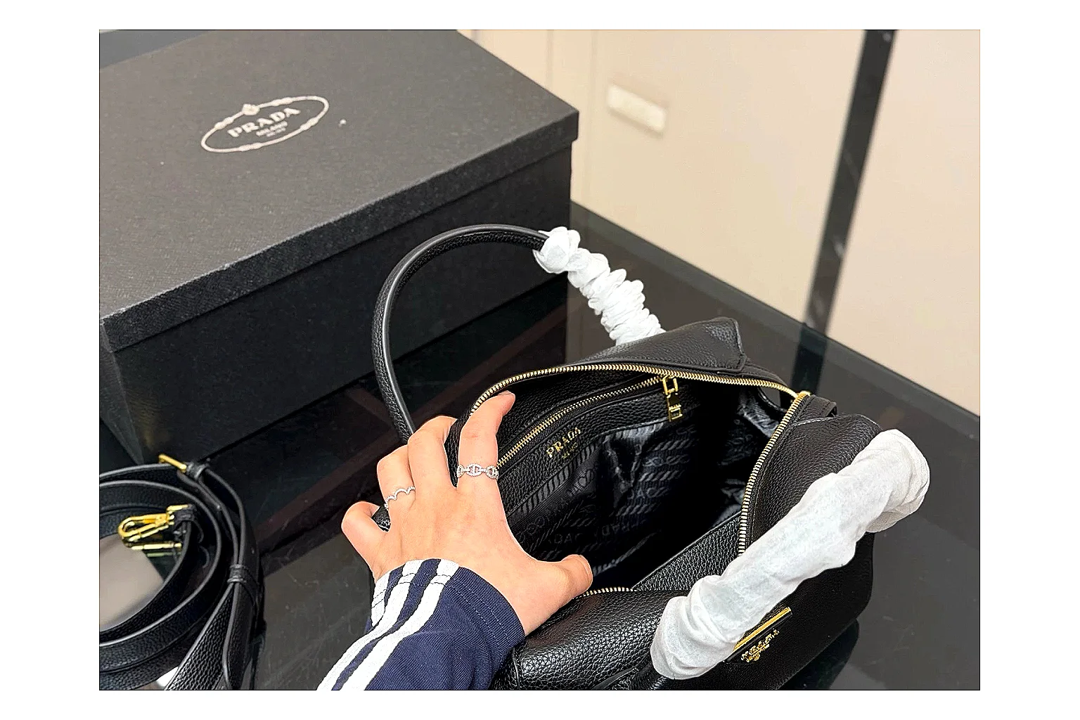 Prada Mini Top Handle Black budget find photo showing black leather mini bag body, structured top handle, compact silhouette, and clean metal hardware thumbnail 5