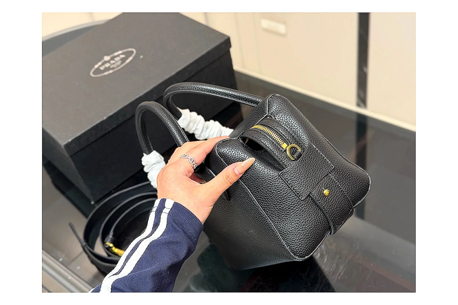 Prada Mini Top Handle Black budget find photo showing black leather mini bag body, structured top handle, compact silhouette, and clean metal hardware thumbnail 6