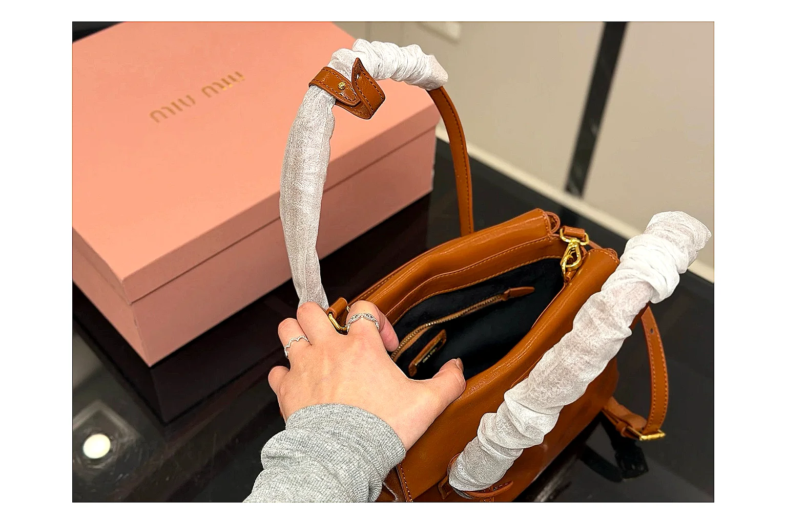 Prada Mini Top Handle Orange Brown budget find photo showing orange brown leather mini bag body, structured top handle, compact shape, and clean hardware details thumbnail 5