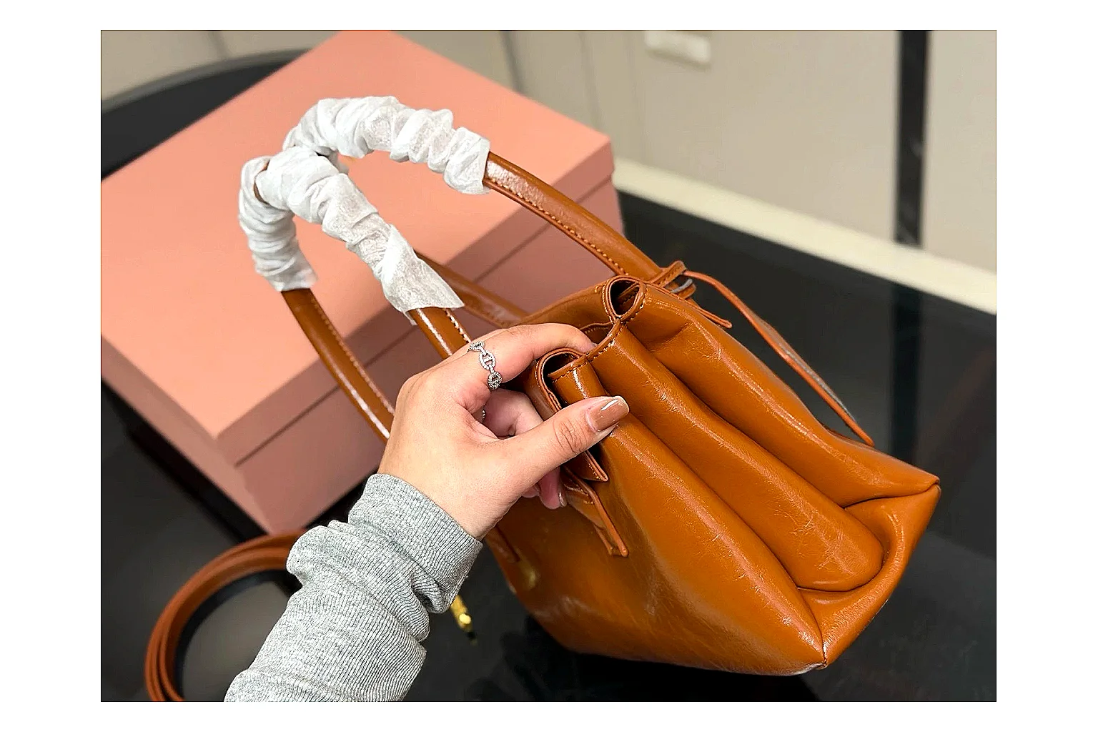 Prada Mini Top Handle Orange Brown budget find photo showing orange brown leather mini bag body, structured top handle, compact shape, and clean hardware details thumbnail 6