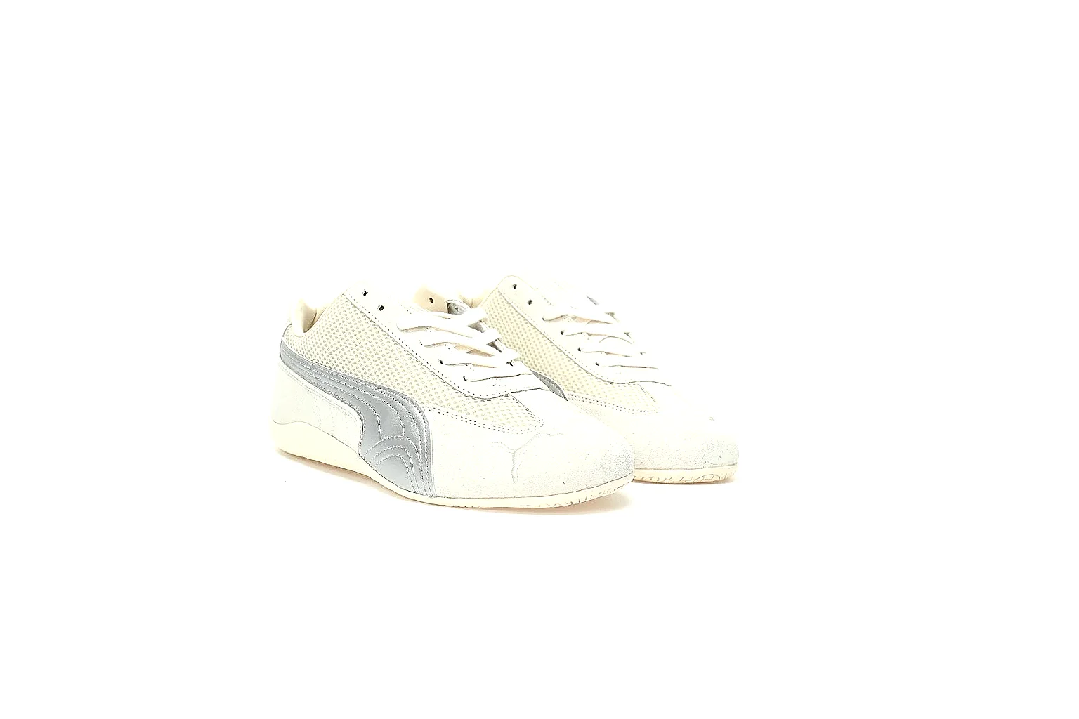 Puma white low-profile trainer photographed from the side thumbnail 6